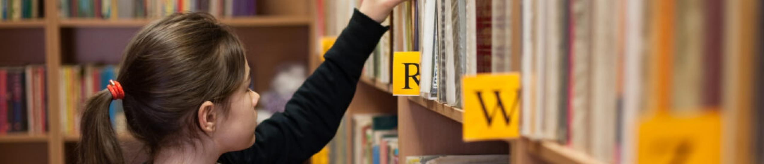 Lo Studio di Openpolis sull'importanza delle biblioteche per bambini e ragazzi